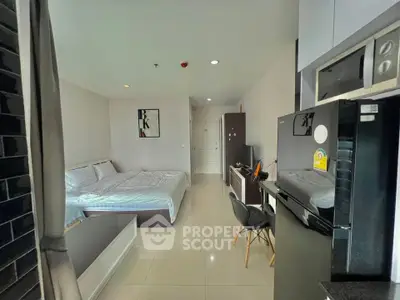 Modern studio apartment with sleek furnishings and open layout