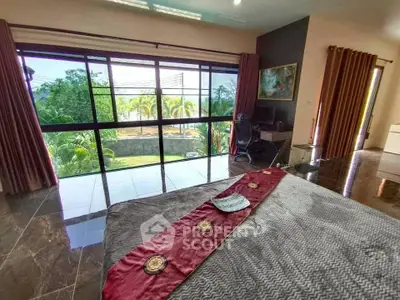 Luxurious bedroom with stunning garden view and elegant decor