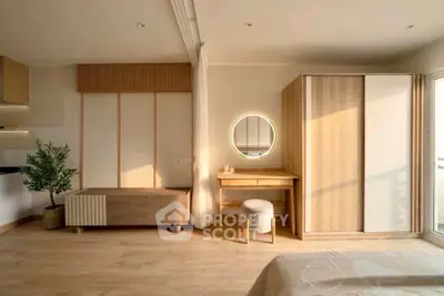 Modern bedroom with stylish wooden furniture and natural light