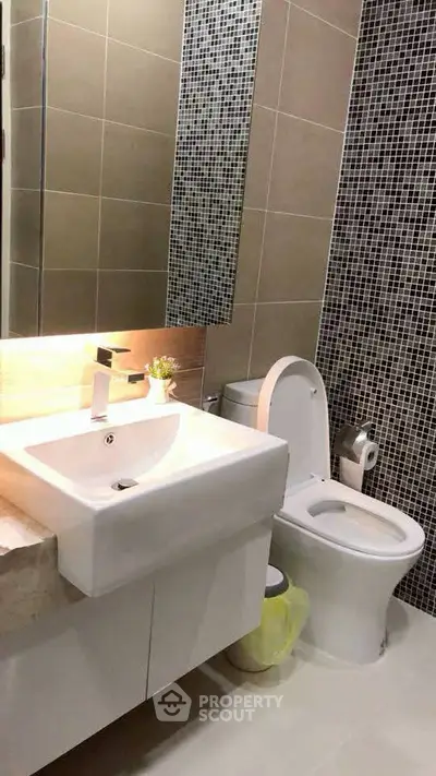 Modern bathroom with stylish tiles and sleek fixtures