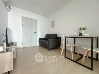 Modern living room with sleek furniture and minimalist decor