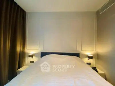 Cozy bedroom with modern lighting and elegant decor