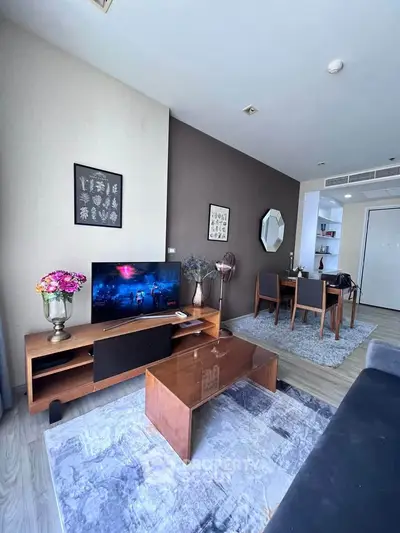 Modern living room with stylish decor and entertainment setup