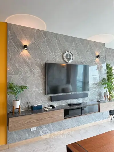 Modern living room with sleek TV setup and stylish decor