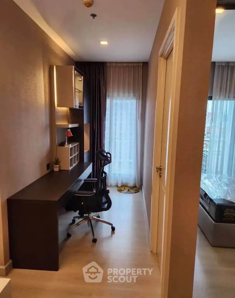 Modern study area with sleek desk and ergonomic chair in a stylish apartment