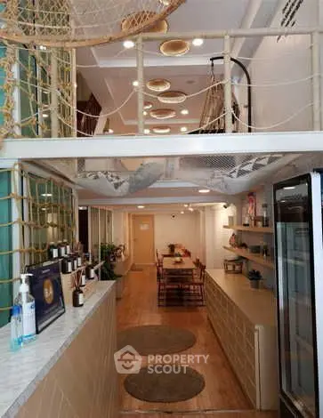 Chic modern interior with mezzanine, stylish decor, and open layout perfect for trendy urban living.