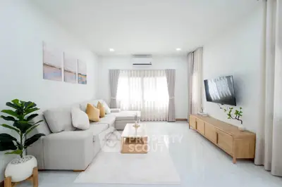 Spacious modern living room with elegant decor and natural light