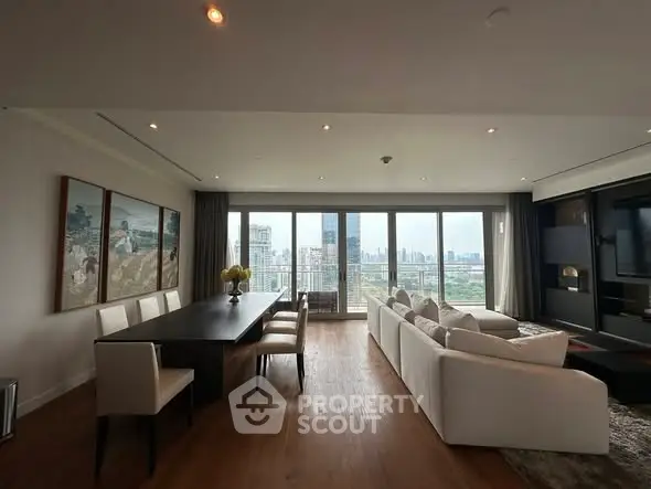 Luxurious living room with panoramic city views and elegant decor
