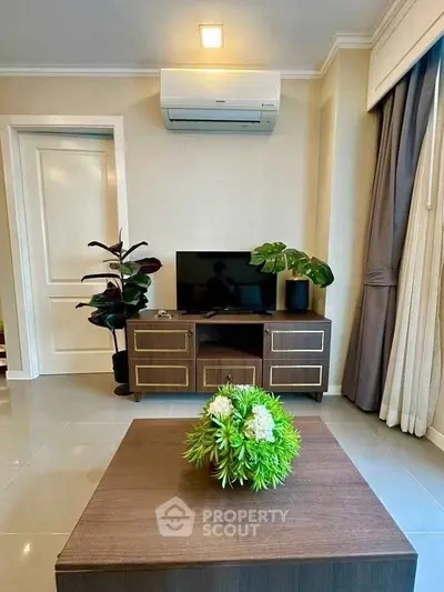 Stylish living room with modern decor and air conditioning unit