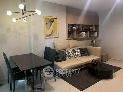 Modern living room with stylish decor and elegant lighting