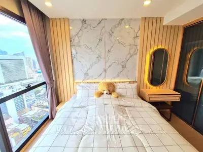 Modern bedroom with city view and stylish decor