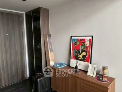 Stylish modern interior with art and sleek furniture in a cozy living space.