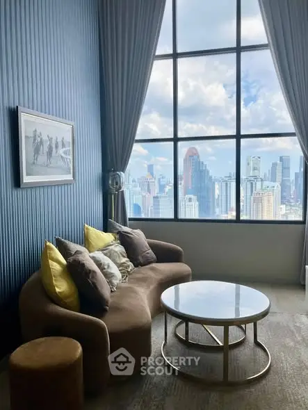 Luxurious living room with stunning city view and elegant decor
