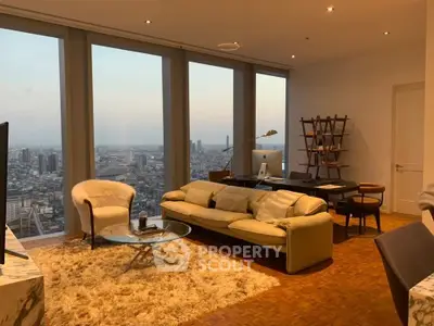 Luxurious living room with stunning city view, modern furniture, and cozy ambiance.