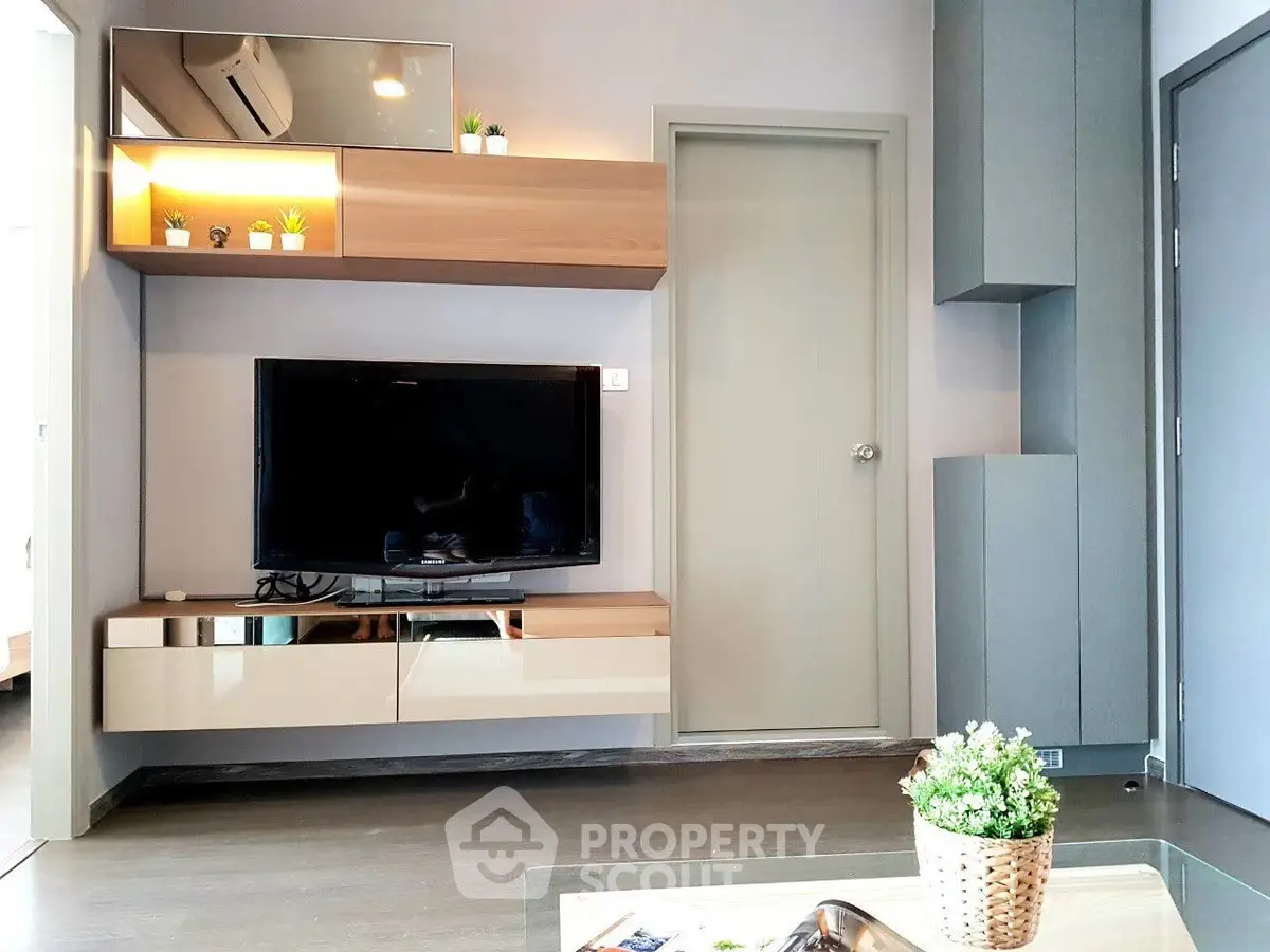 Modern living room with sleek TV unit and stylish decor