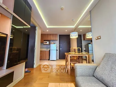 Modern apartment interior with open kitchen and cozy living area