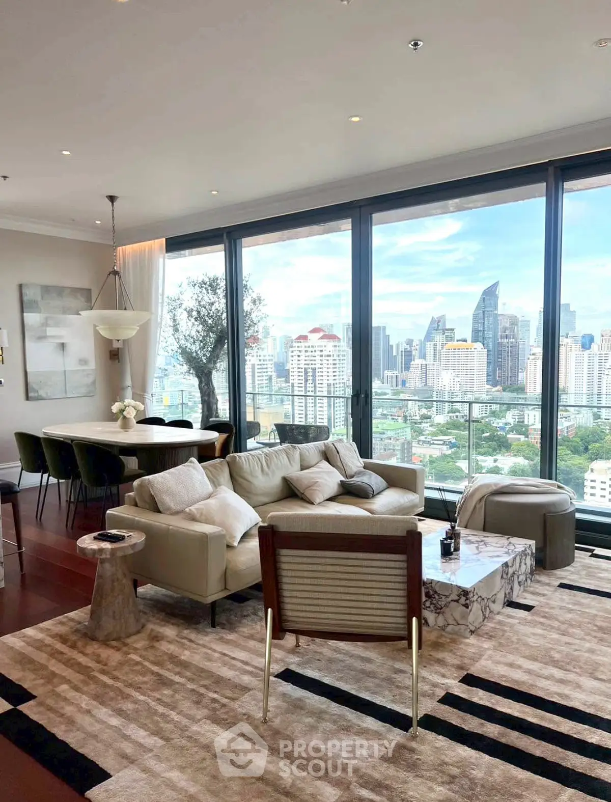 Luxurious living room with panoramic city view and modern decor
