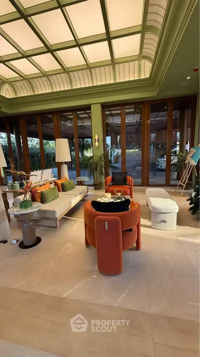 Luxurious living room with elegant furniture and large windows offering stunning views.