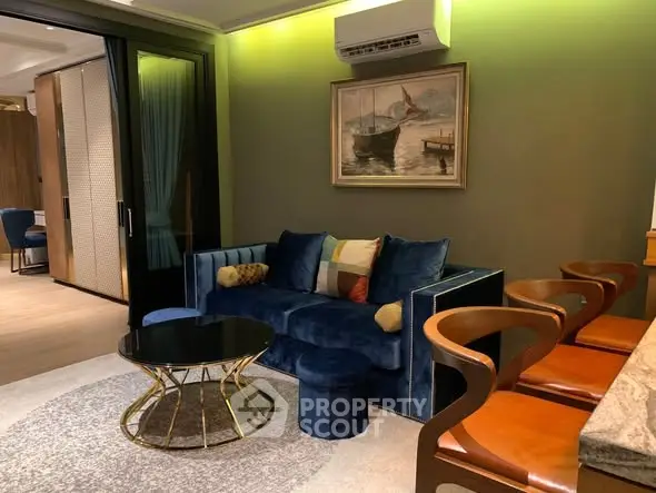 Stylish living room with modern furniture and elegant decor in a luxurious apartment.