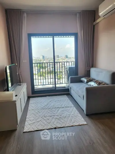 Modern living room with balcony view in urban apartment