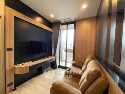 Modern living room with cozy seating and large window offering city view