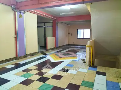 Spacious interior with colorful tiled flooring and open layout