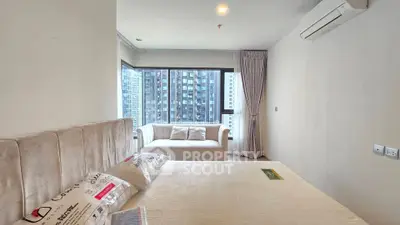 Modern bedroom with city view and elegant furnishings