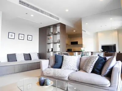 Spacious modern living room with elegant decor and open layout, perfect for relaxation and entertaining.