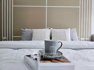 Cozy bedroom with stylish decor and inviting ambiance, perfect for relaxation.