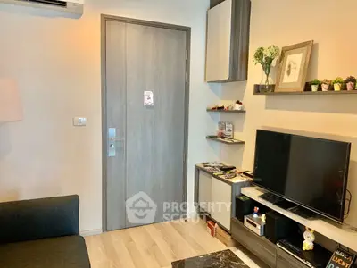 Modern living room with sleek decor and entertainment setup