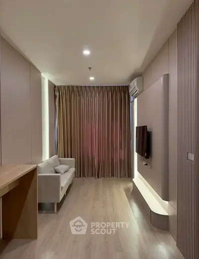 Modern living room with sleek design and cozy ambiance