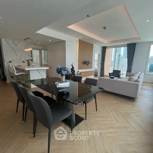 Luxurious open-plan living room with city view and modern furnishings