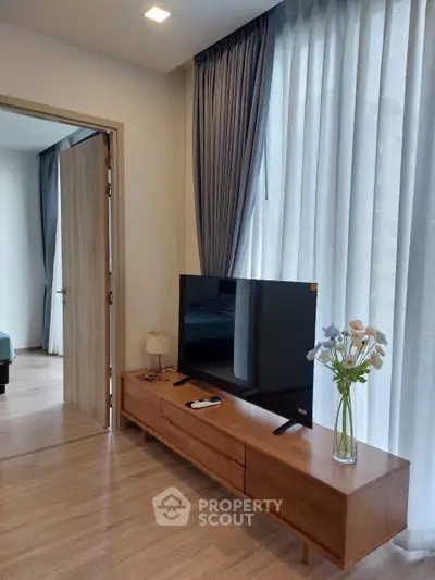 Modern living room with sleek TV stand and elegant decor