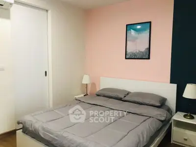 Cozy bedroom with modern decor and soft lighting