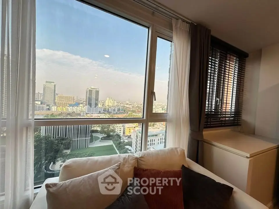 Spacious living room with stunning city view from large windows