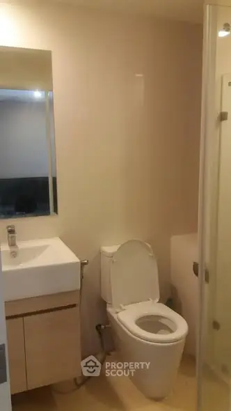 Modern bathroom with sleek fixtures and neutral tones