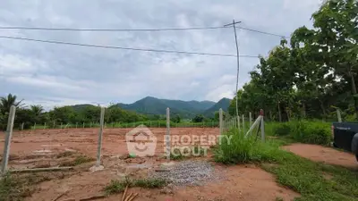 Scenic land plot with mountain views, ideal for development or investment.