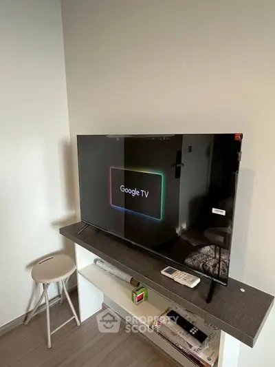 Modern living room corner with sleek TV setup and minimalist decor