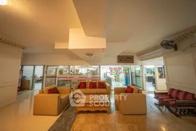 Spacious living room with cozy seating and elegant decor