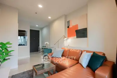 Modern living room with stylish leather sofa and contemporary decor