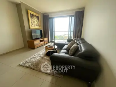 Modern living room with leather sofa and balcony view in luxury apartment