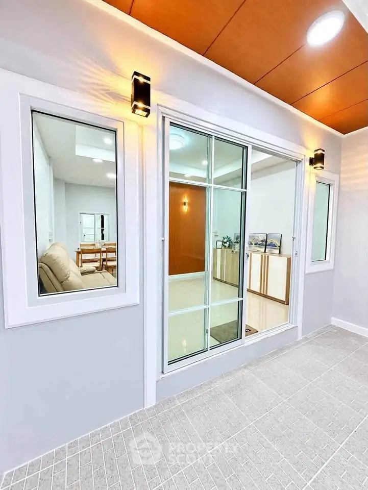 Modern interior with sliding glass doors and cozy living area