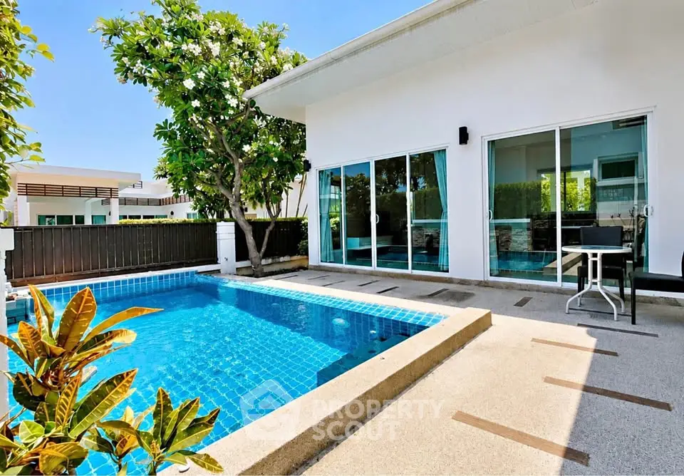 Stunning modern villa with private pool and lush garden, perfect for luxury living.