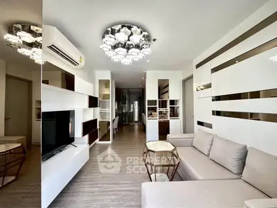 Modern living room with stylish decor and elegant lighting