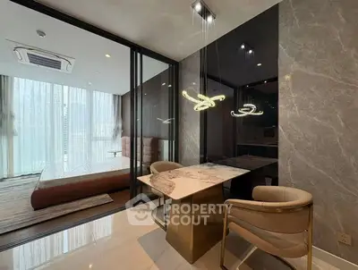 Luxurious modern bedroom with elegant marble dining area and stylish lighting