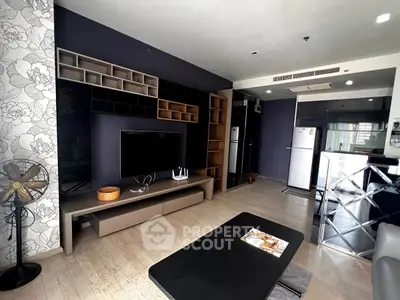 Modern living room with stylish TV unit and open layout