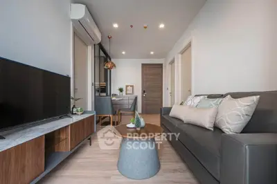 Modern living room with sleek furniture and stylish decor