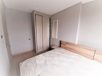 Modern bedroom with minimalist design and built-in wardrobe
