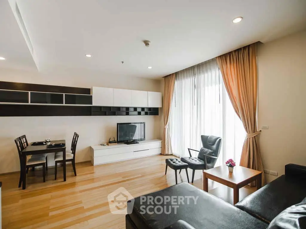 Spacious modern living room with elegant decor and natural light