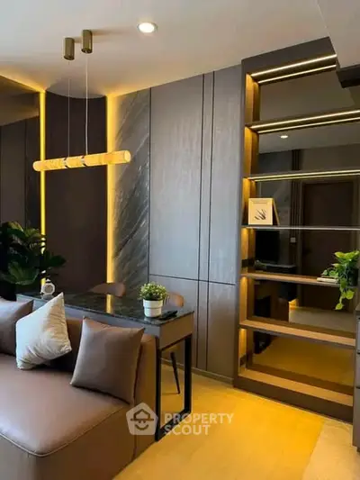 Modern living room with stylish lighting and elegant decor